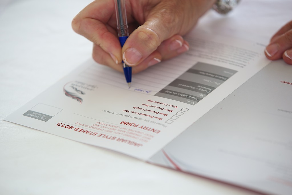A desk with financial forms
