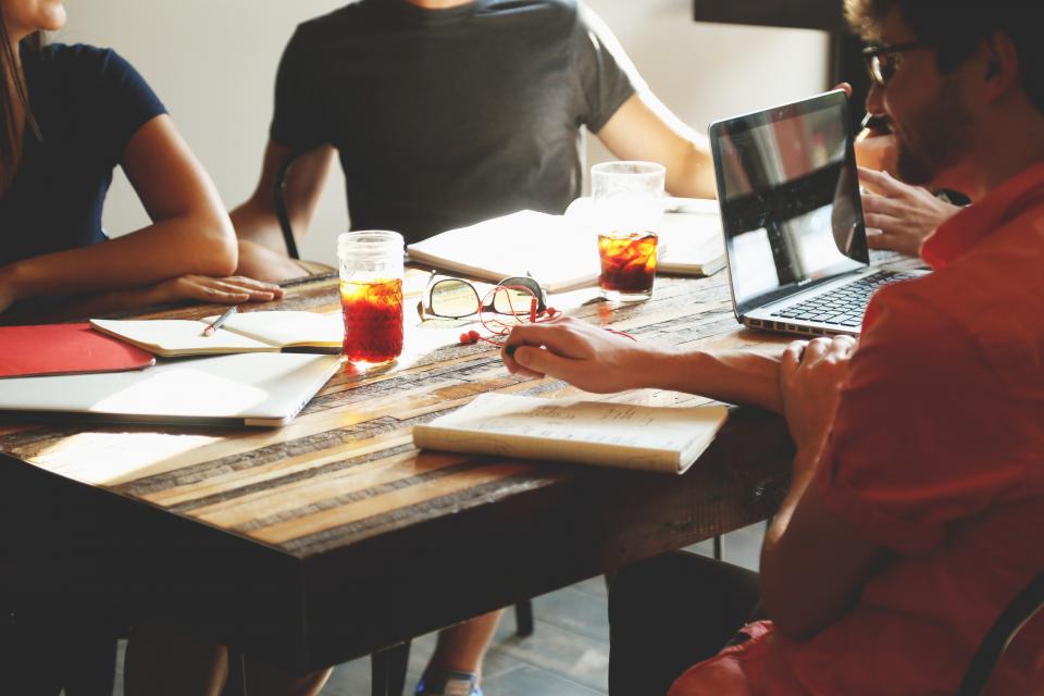 Colleagues working together at a table