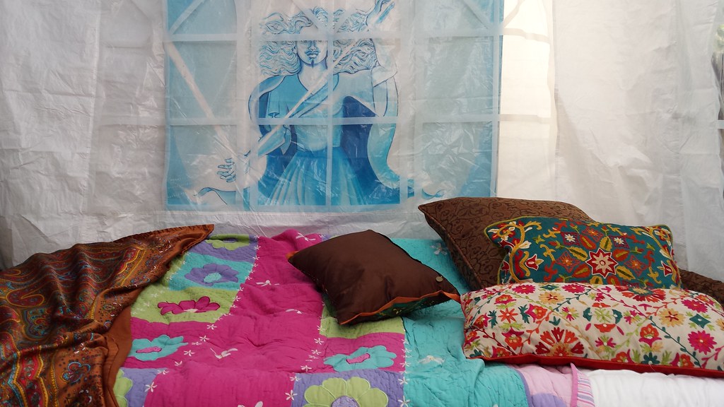Cushions arranged on a bed