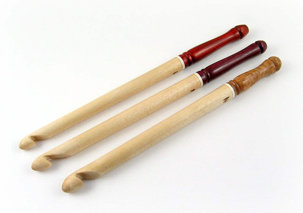 A row of crochet hooks in different sizes