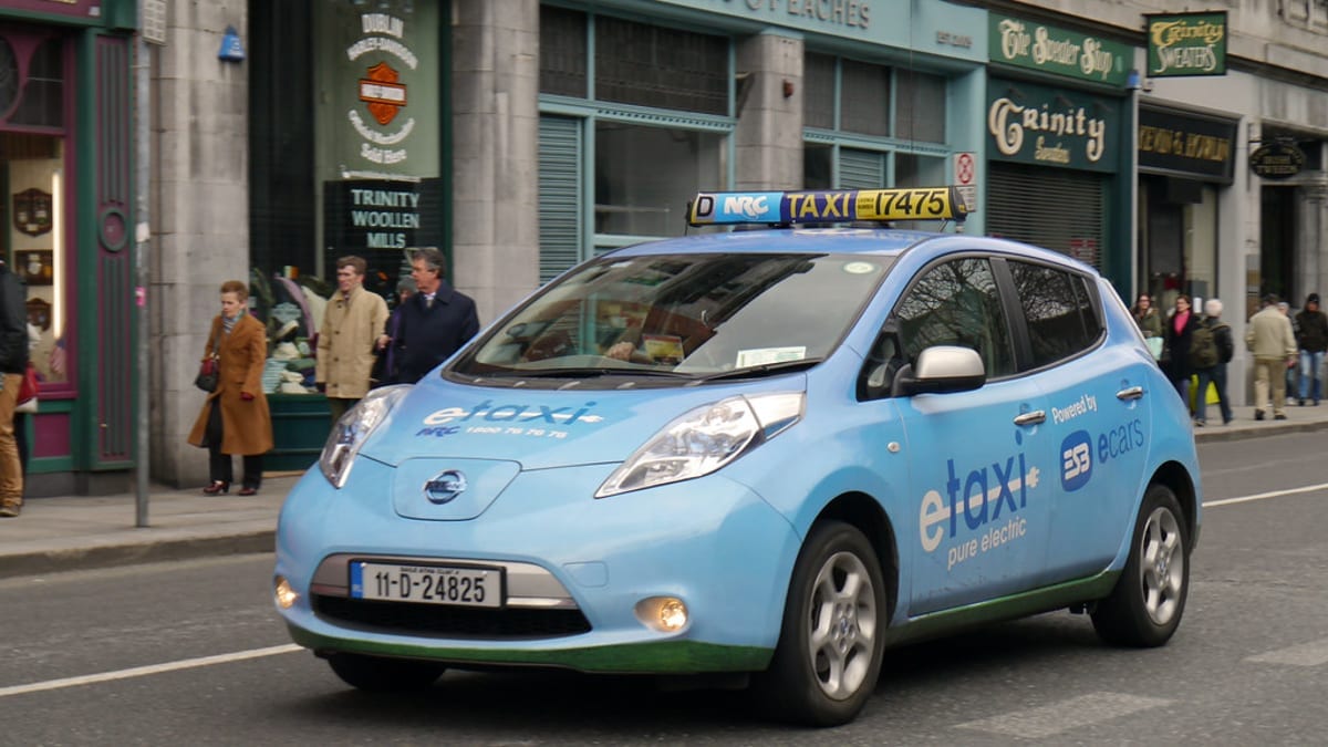 An electric car charging at home