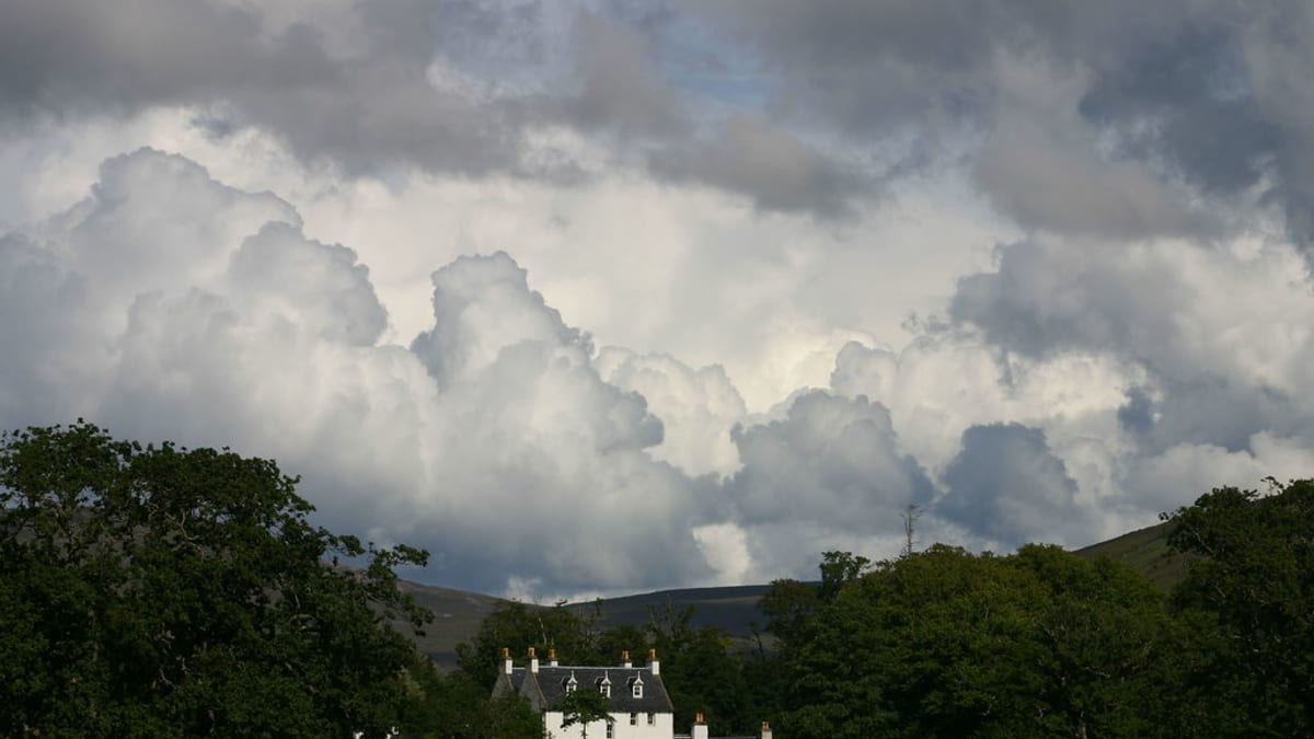 Storm clouds over houses