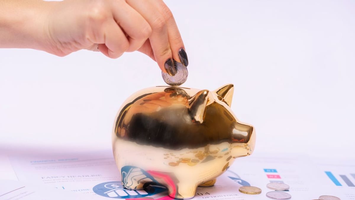 A piggy bank on a windowsill