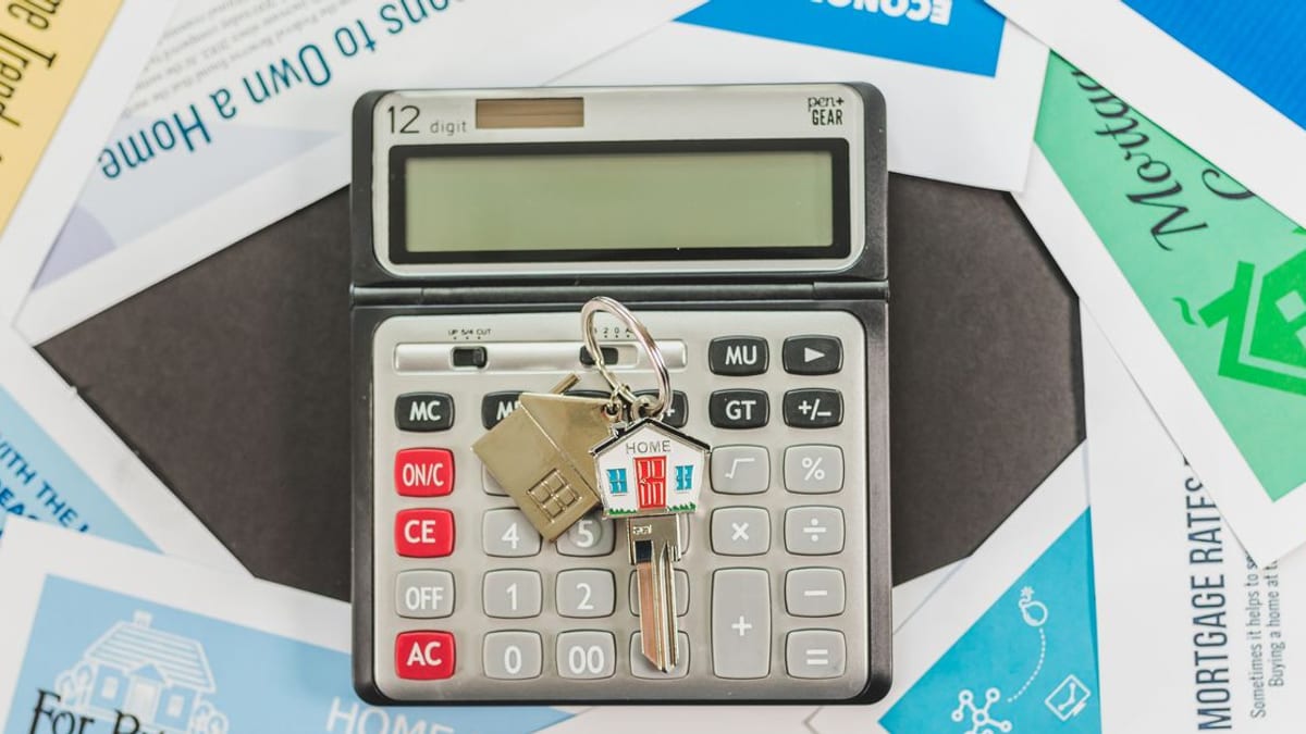 A house key on a document