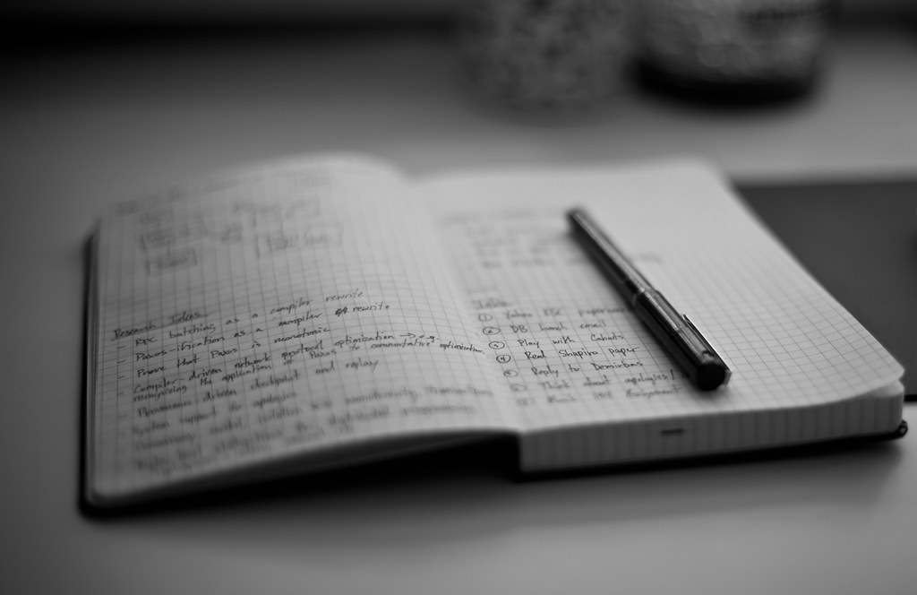 Notebook pen desk