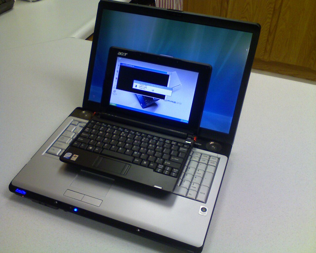 A text prompt being typed on a laptop screen
