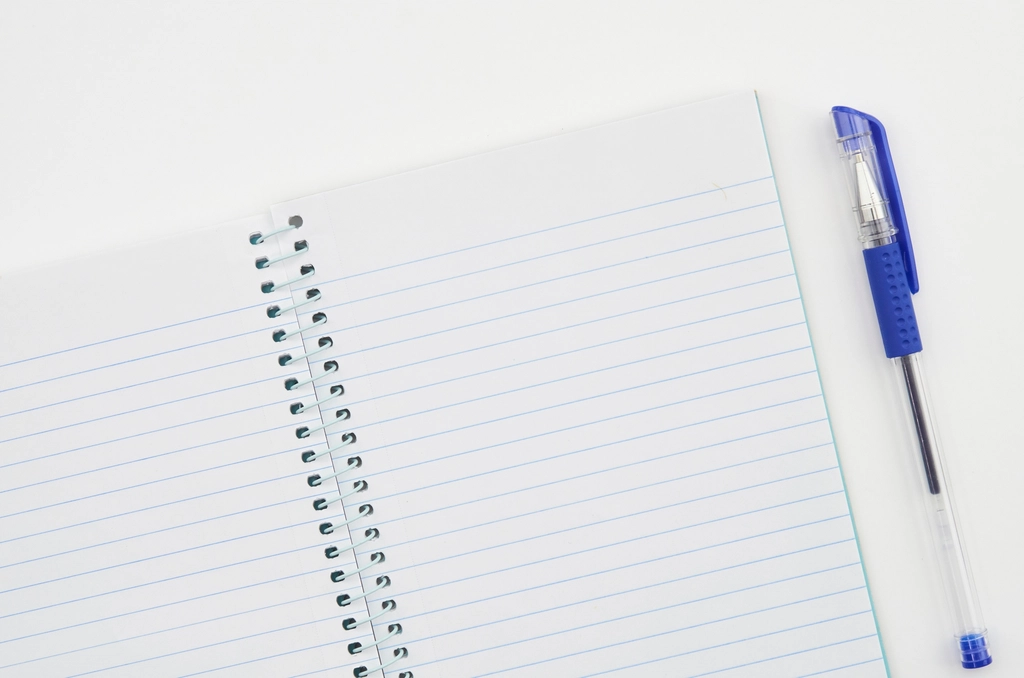 An open notebook and pen