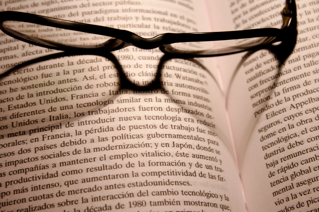 Documents and reading glasses on a table