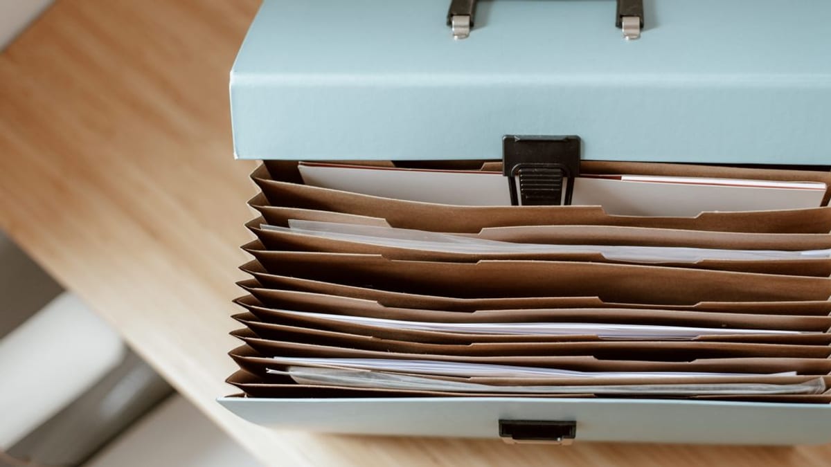 A folder of documents on a desk