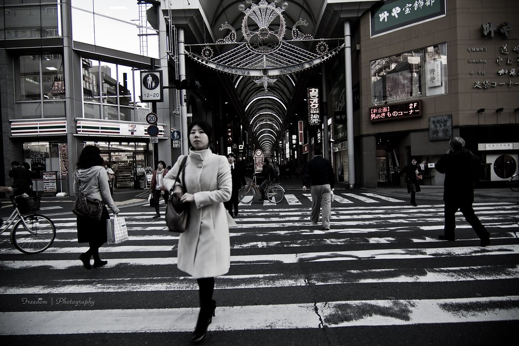 A person walking on a quiet street